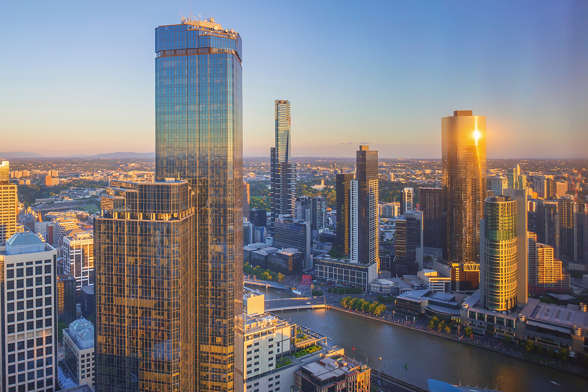 Female trades persone in front of a wall of handtools in a Melbourne Workshop
