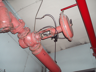 Pneumatic heating valve controlled via an electronic to pneumatic transducer in a roof plant room in the Melbourne CBD