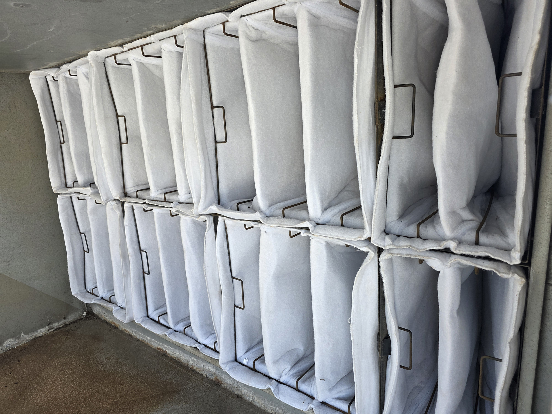 Property Services Audits - HVAC Air Filters serving mechanical plant on roof top in Sydney, New BAG Filters installed recently, clean and tight installation, good result