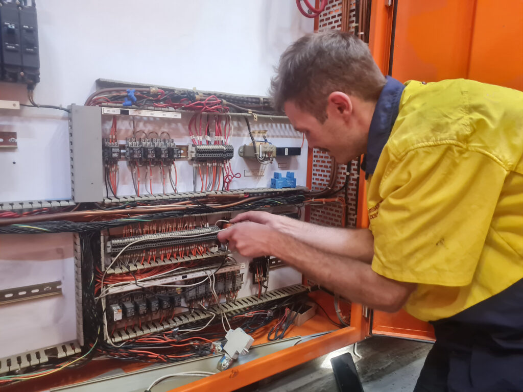 electrical contractors - wr8tech making control repairs for a car park exhaust fan at Sydney Opera House Car Park HVAC mechanical services, Switchboard. 250 kilowatt motor under control via Variable speed drive (not shown here)