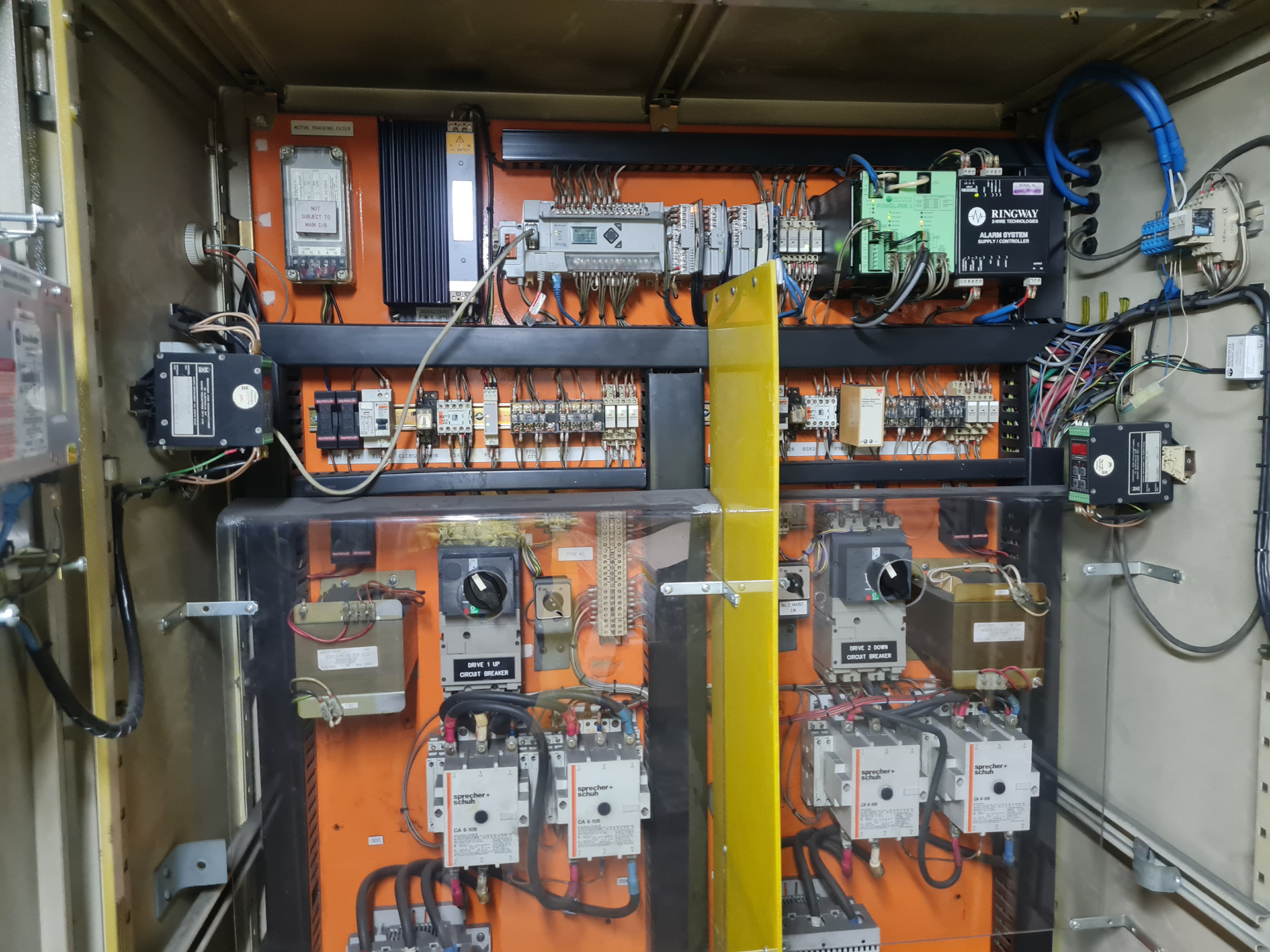 electrical contractors - wr8tech workiing on a panel whcih servies a travelator in the Sydney CBD. investiagating a teacking fault" as well as an interface for remote stop/start. Sydney