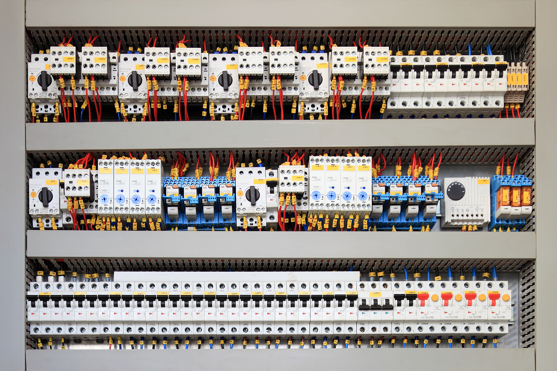 Electrical Contractors - HVAC Control panel with various contactors, overloads, timers, circuit breakers, switches and other electrical mechanical control components to make the HVAC plant run in a Melbourne Commercial Building