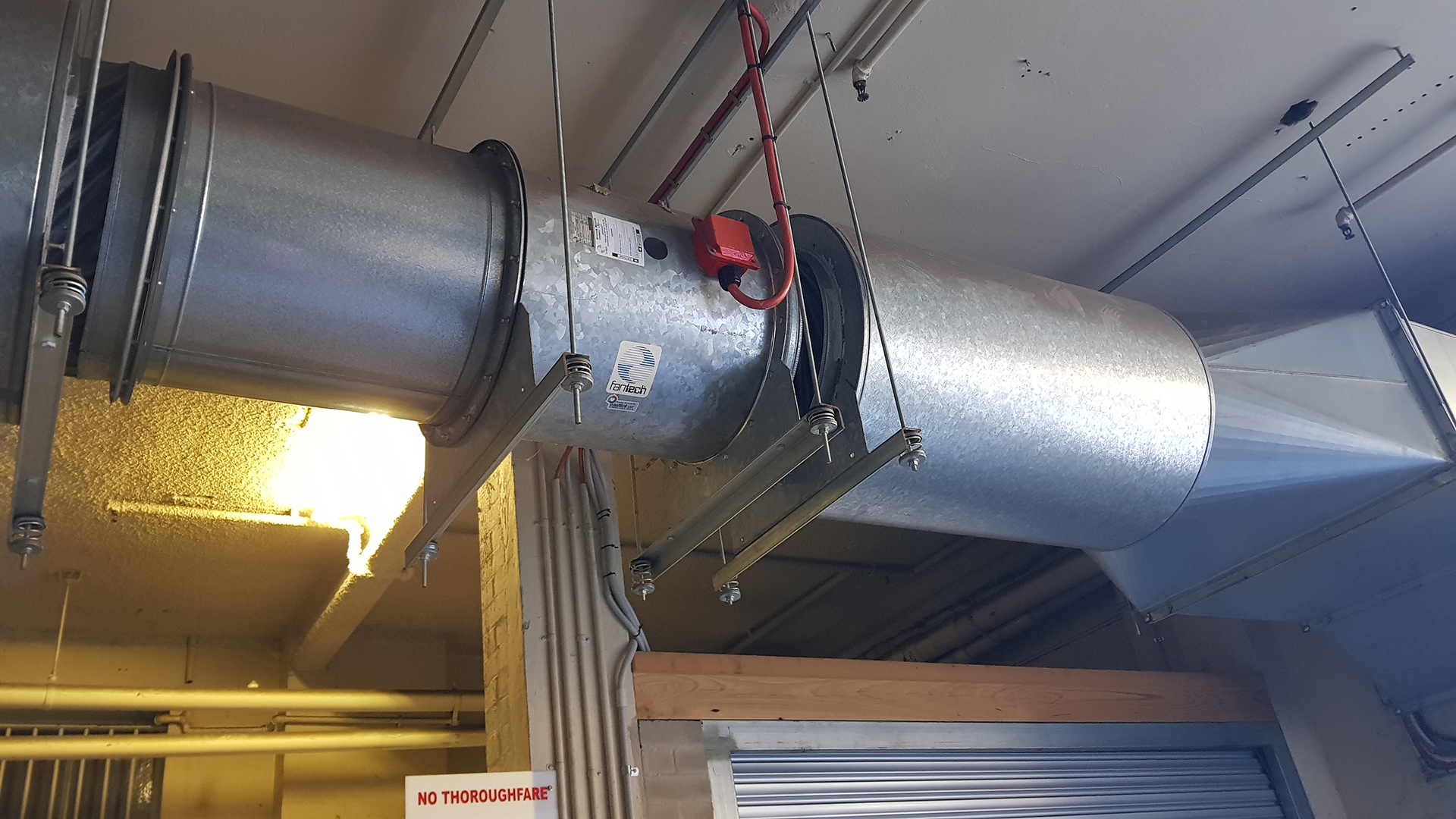 Strata Car park for apartment building in North Ryde in NSW with one carpark exhaust fan serving the lower car park controlled via Co System and Mechanical Services Switchboard.