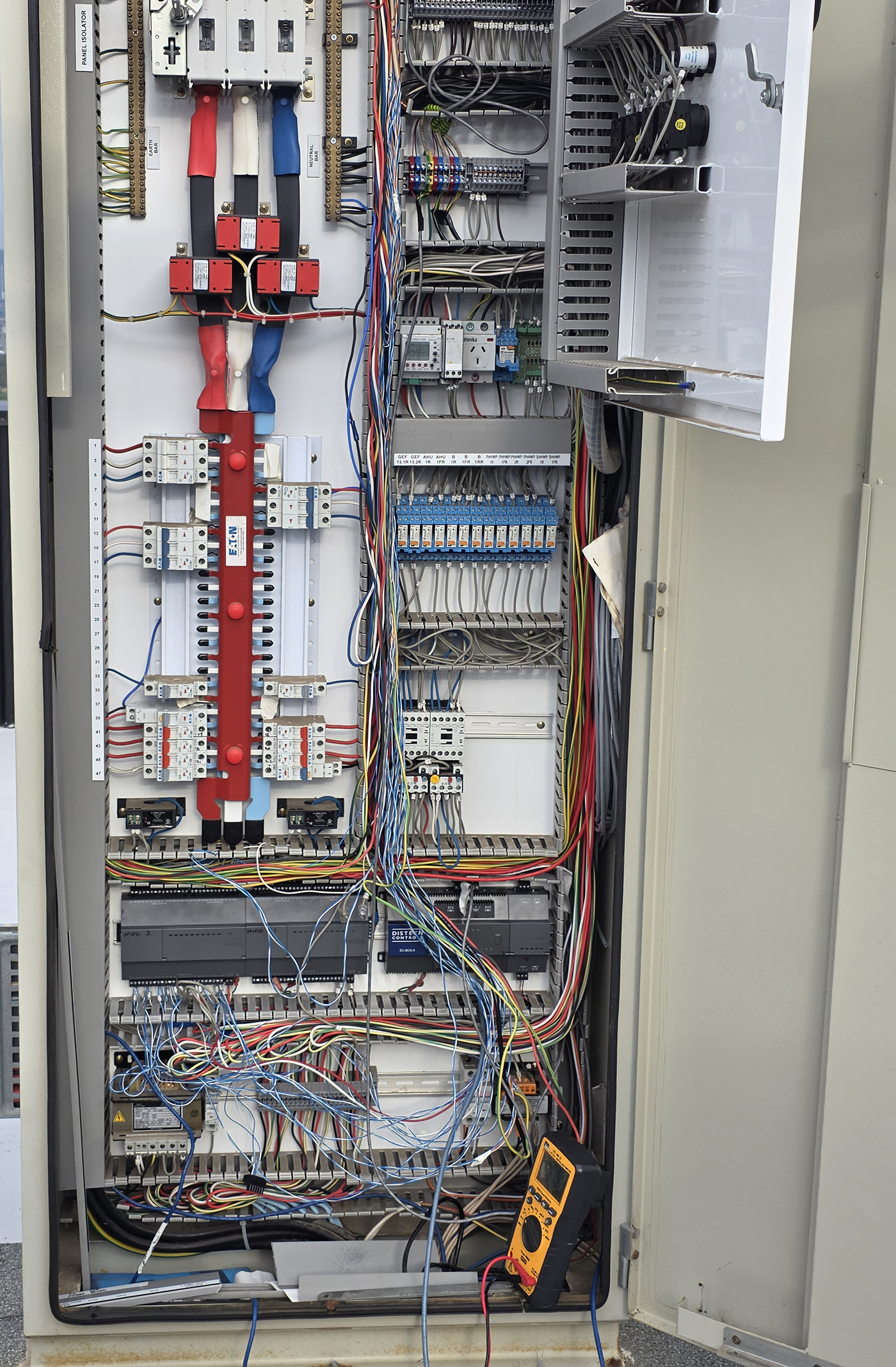HVAC Monitoring for Unsupervised Buildings - Mechanical Services HVAC Mechanical switchboard in Melbourne Commercial Building serving multiple exhaust air fans and supply air fans, and one Airhandling Unit
