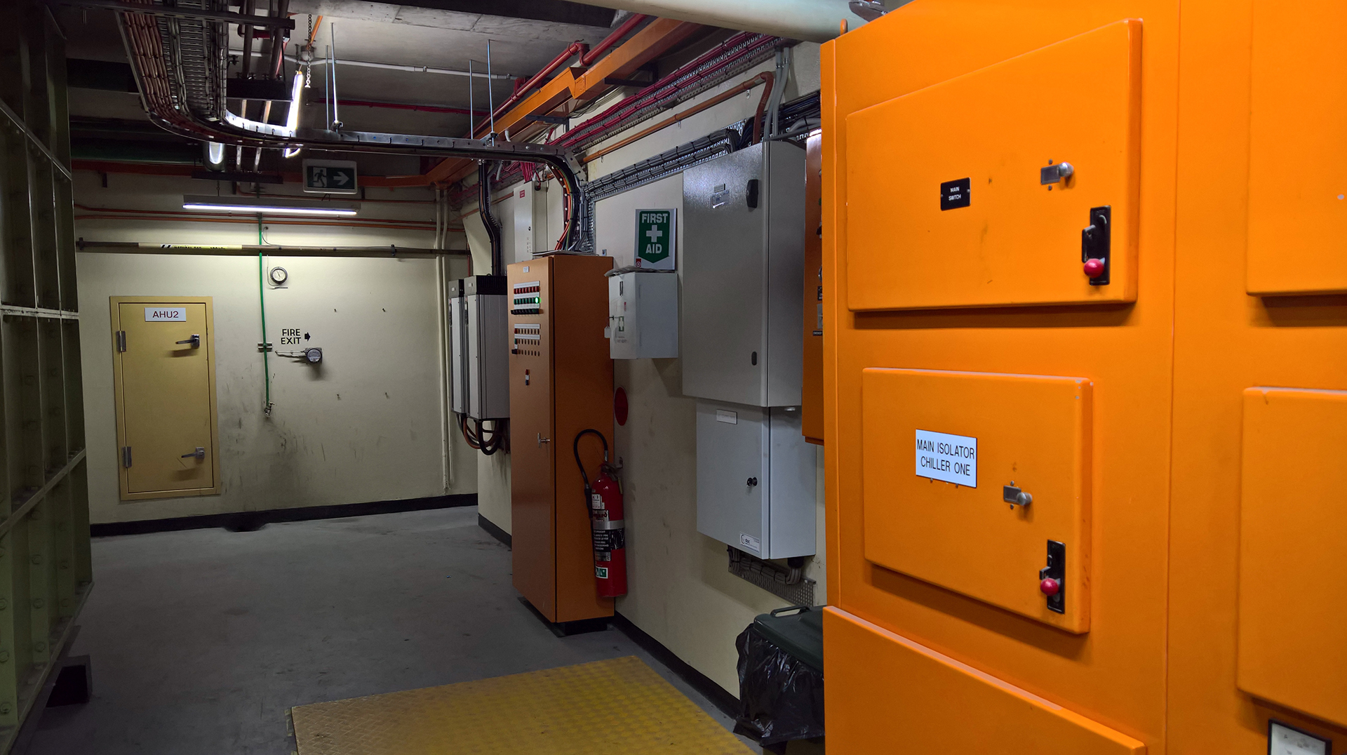 HVAC Monitoring for Unsupervised Buildings - Mechanical Services HVAC Mechanical switchboard in Sydney Commercial Building in rooftop plantroom with multiple switchboards and control panels, all to be put together into an upgrade with the switchboards and the BMS