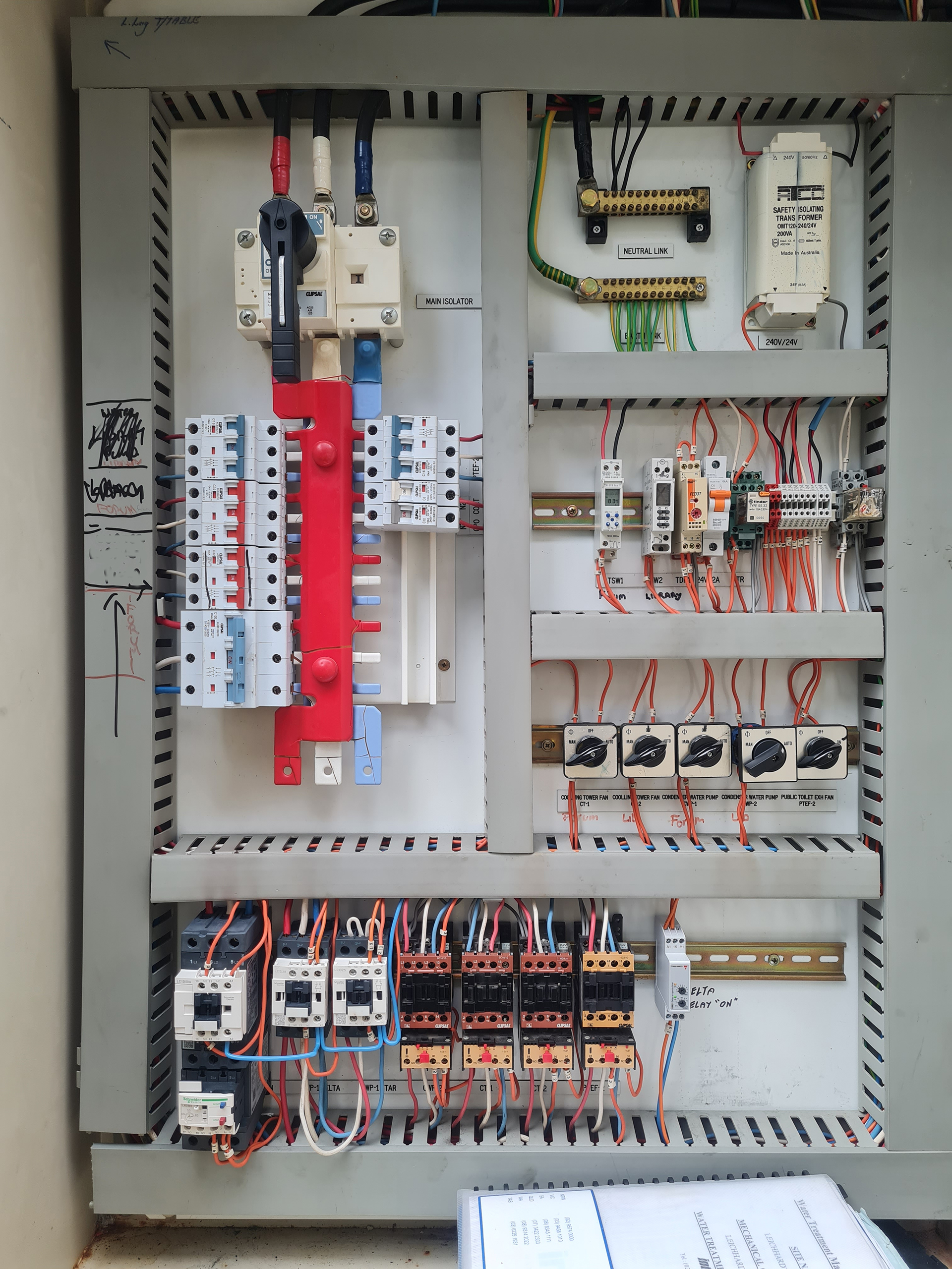Ageing rooftop Mechanical Services Switchboard with cracked busbar insulation and corrosion requiring replacement in a commercial building.