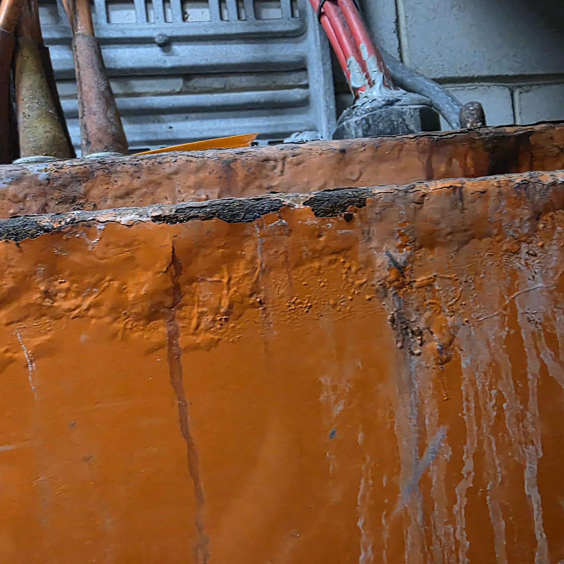 Corroded Mechanical Services Switchboard showing extensive rust and moisture damage in a commercial building plant room.