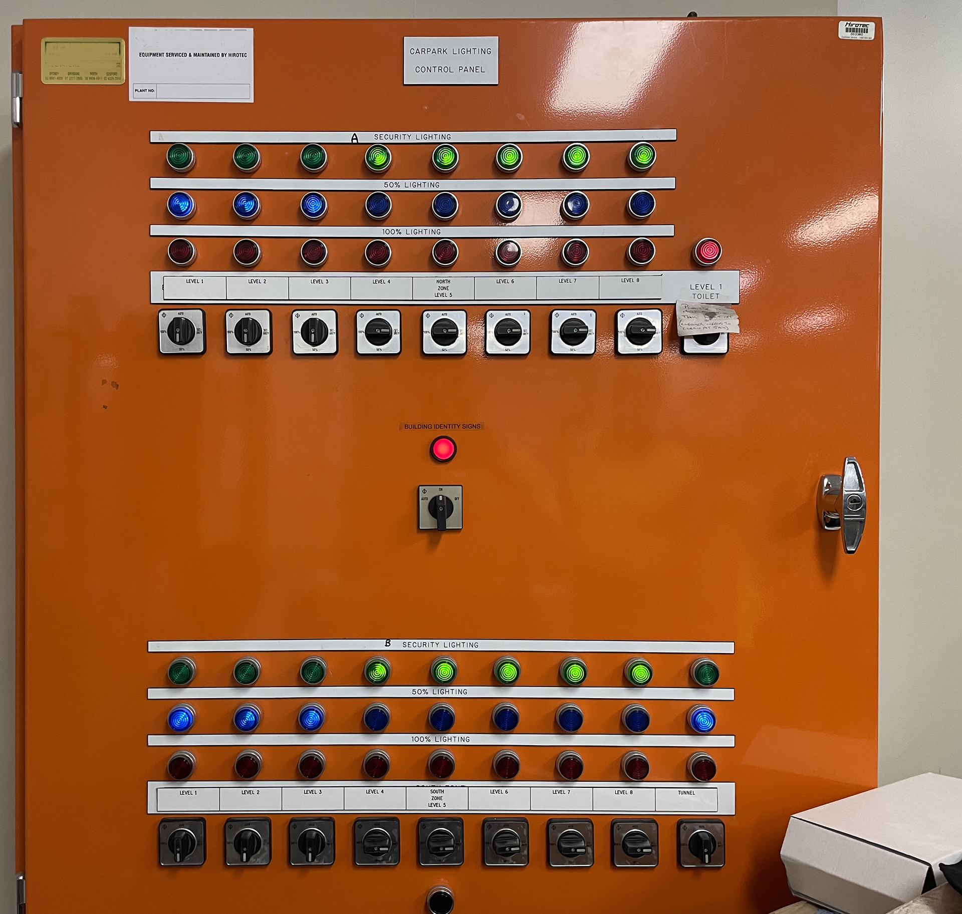 Commercial car park lighting control panel managing multiple lighting zones and security lighting across a multi-level basement.