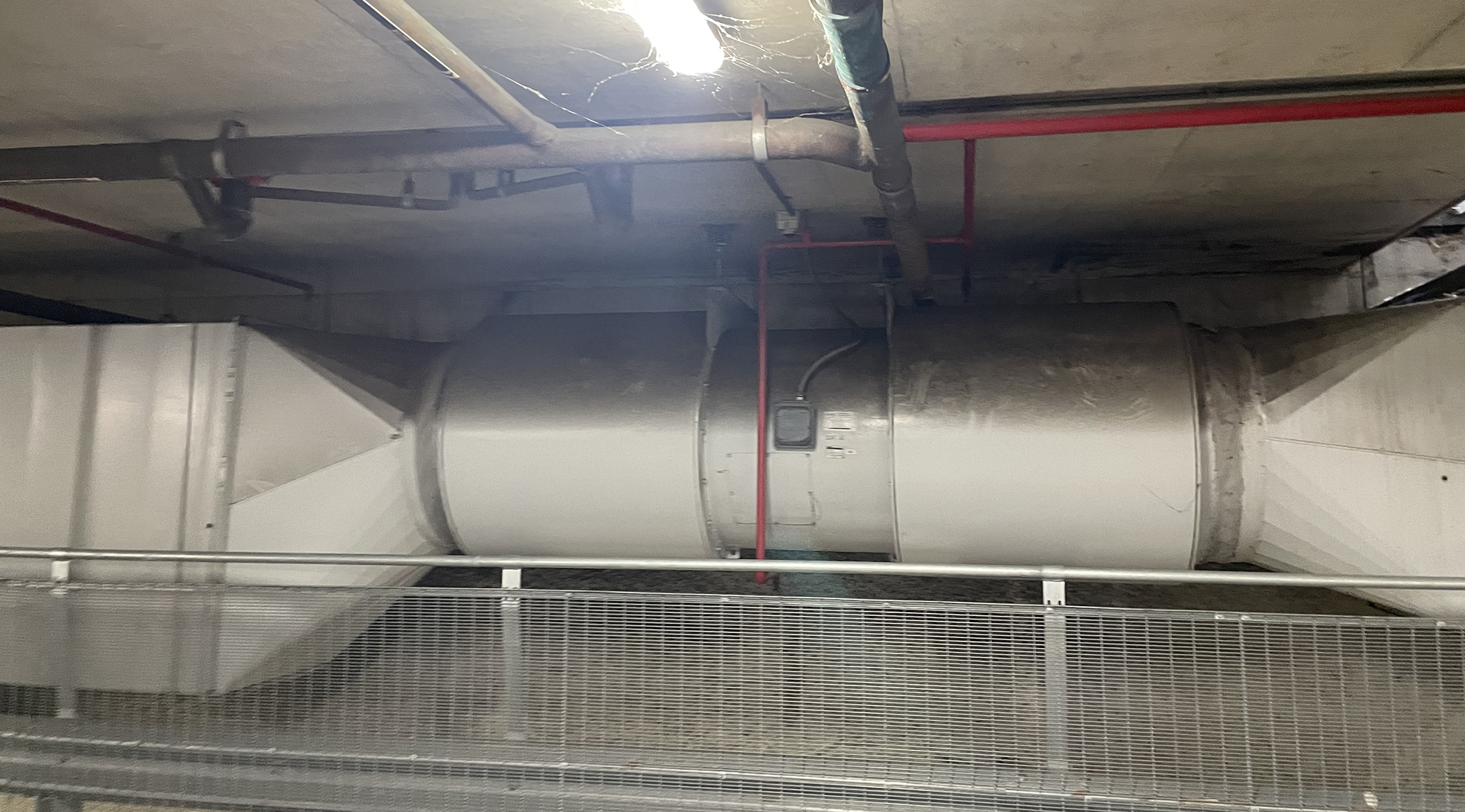 Large commercial car park exhaust fan used for carbon monoxide ventilation and controlled by the Building Management System.
