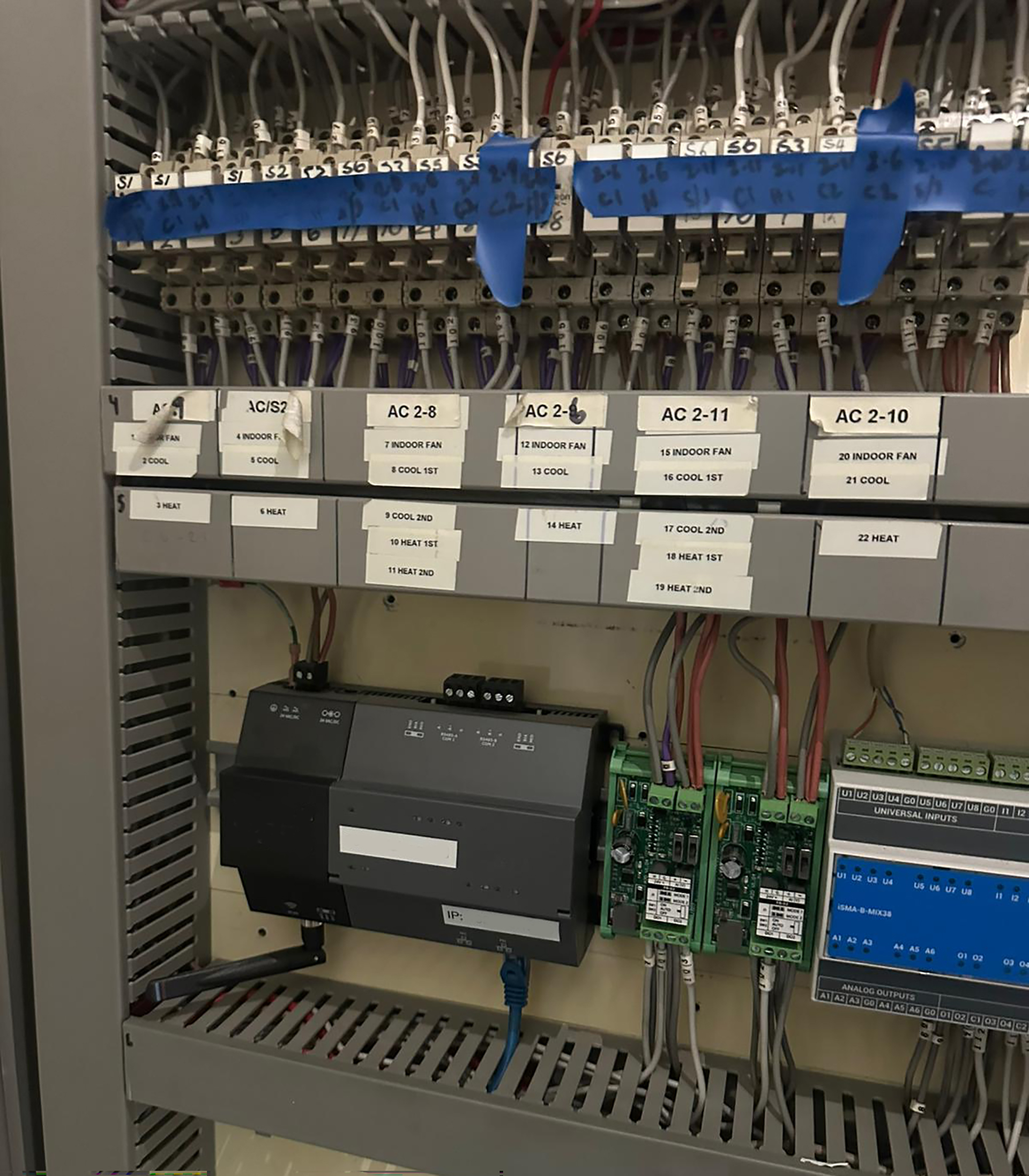 Motorised two-way butterfly valve with electric actuator and adaptor plate connected to a Building Management System in a Sydney commercial building.