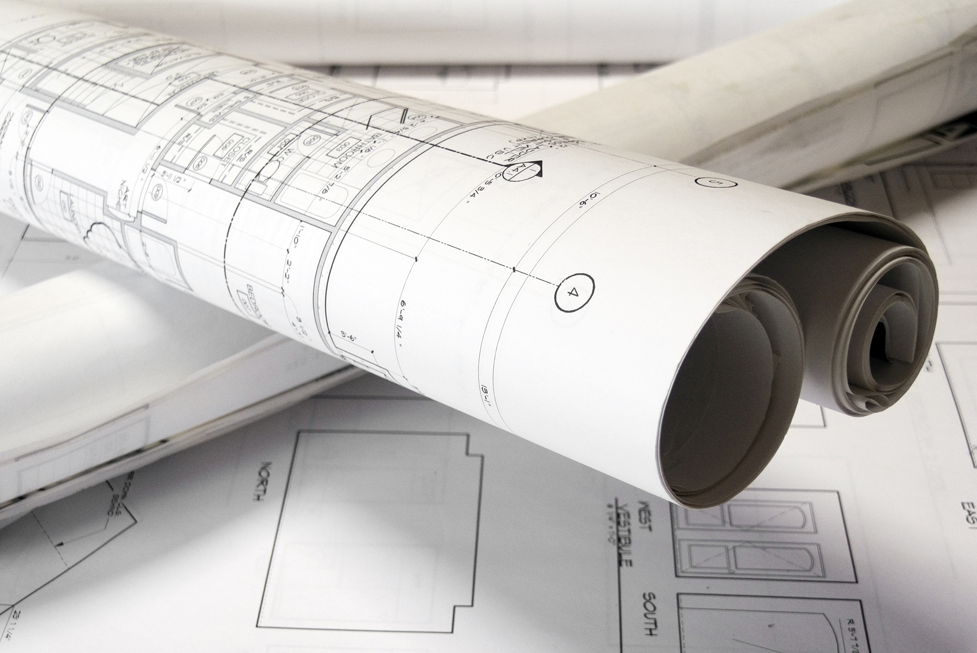 Building plans and technical drawings representing BMS design, documentation and installation planning for commercial building projects.