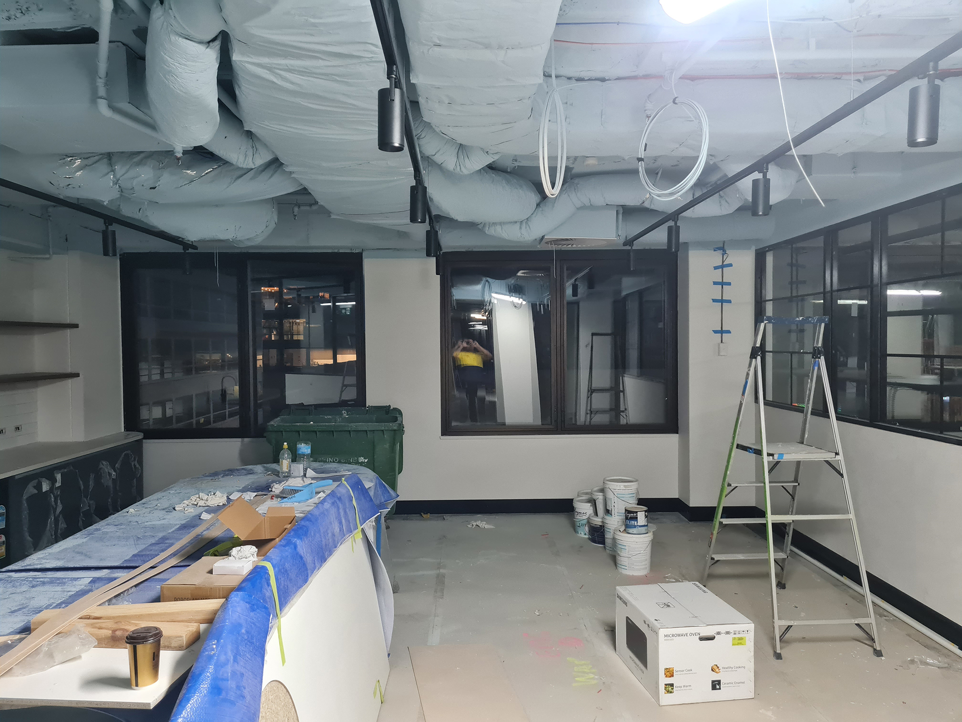 Commercial office refurbishment and tenancy fit-out in Little Collins Street Melbourne showing HVAC ductwork requiring review as part of BMS recommissioning.