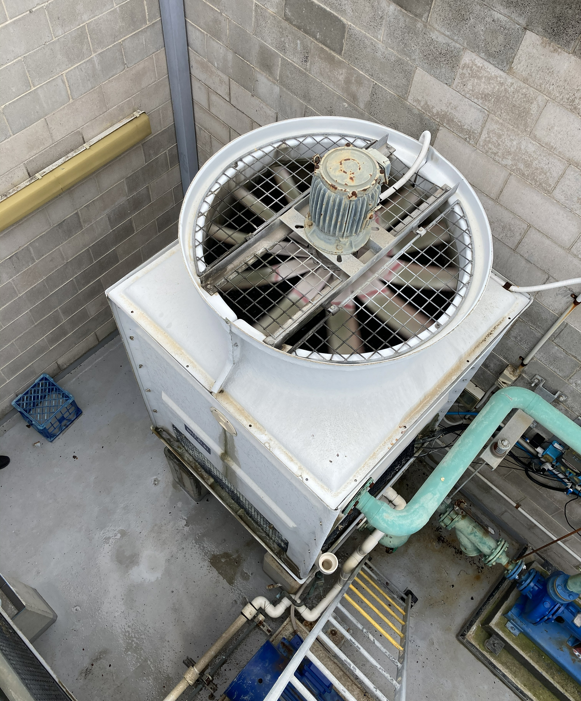 Commercial cooling tower inspected for equipment condition, maintenance requirements and operational risks during an HVAC audit.