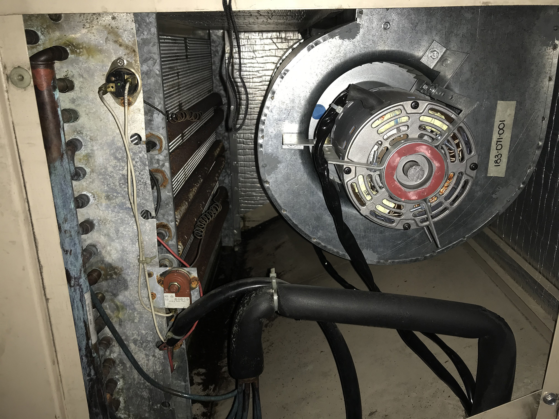 Kilowatt-hour electricity meter representing energy performance assessment during a commercial HVAC audit.