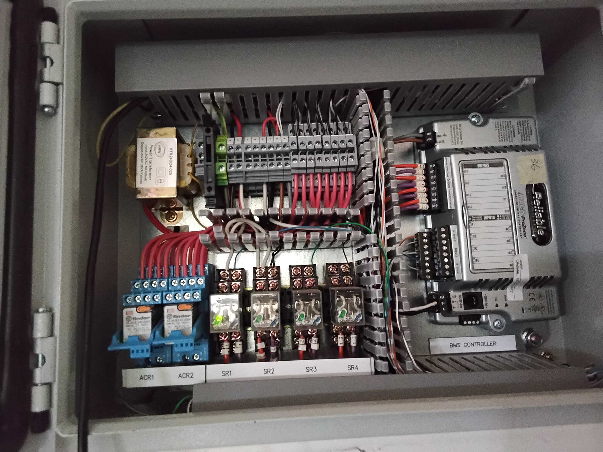 Internal fan coil unit components inspected for condition, airflow, controls and energy performance during an HVAC audit.
